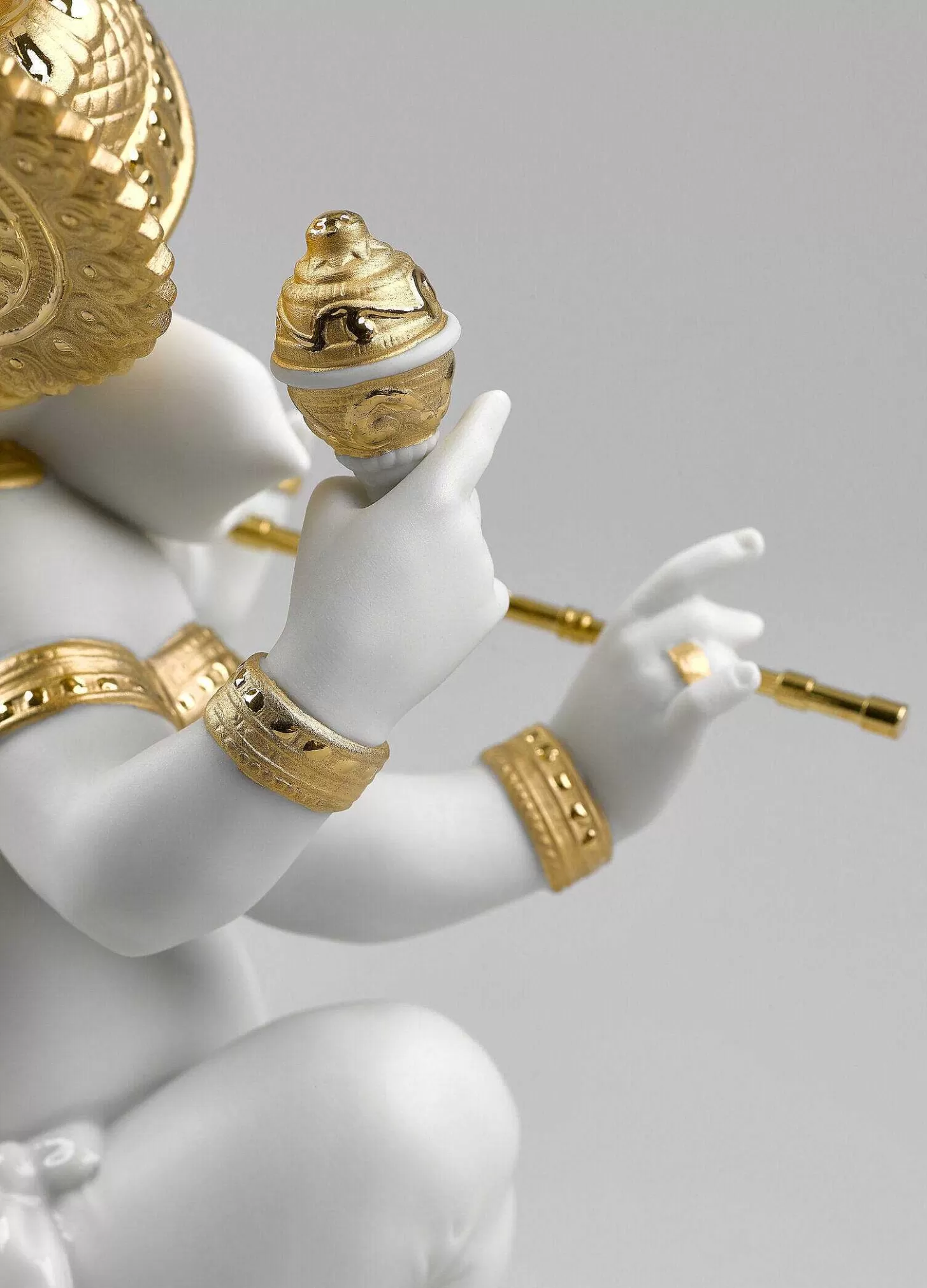 Lladró Bansuri Ganesha Figurine. Golden Lustre^ Hinduism