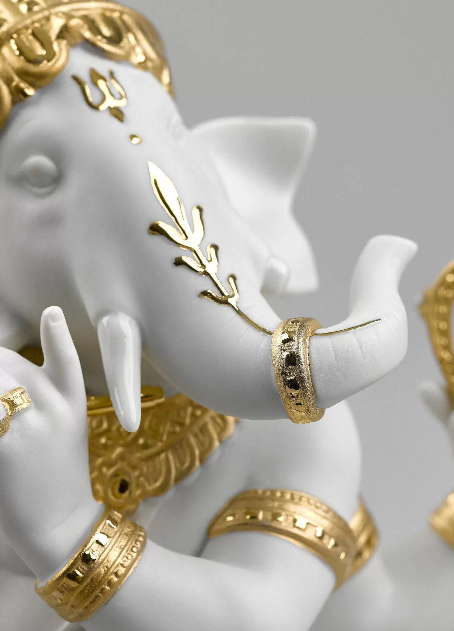 Lladró Bansuri Ganesha Figurine. Golden Lustre^ Hinduism