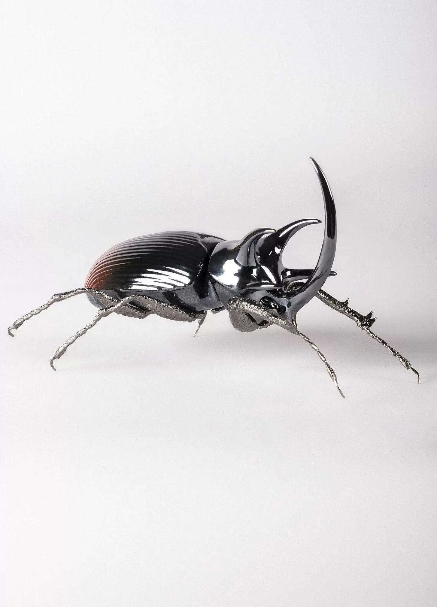 Lladró Rhinoceros Beetle Figurine^ Design