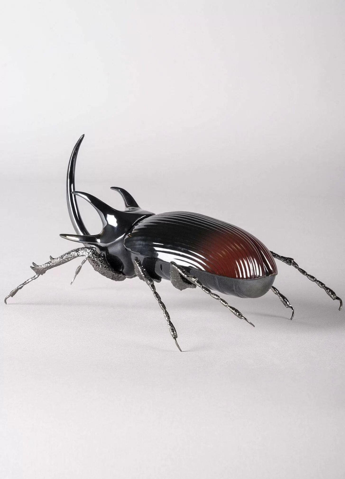 Lladró Rhinoceros Beetle Figurine^ Design